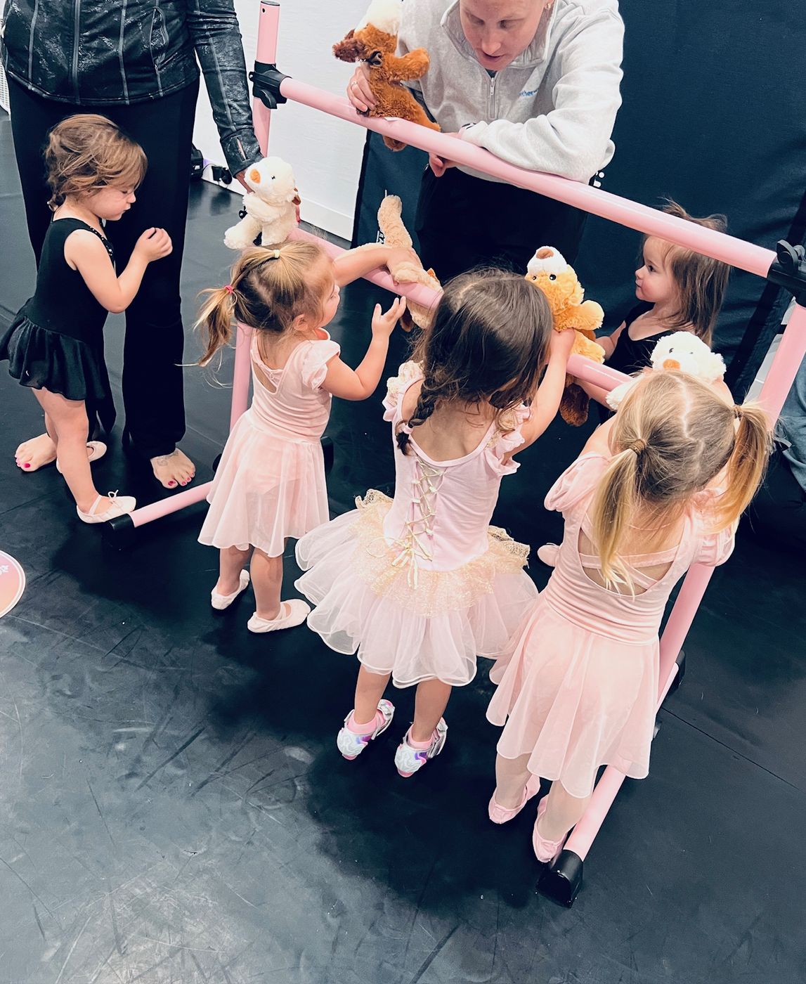 Young dancer practicing at the ballet barre at Florida Dance Gym